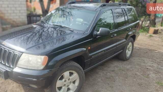Черный Джип Гранд Чероки, объемом двигателя 2.7 л и пробегом 250 тыс. км за 5600 $, фото 1 на Automoto.ua