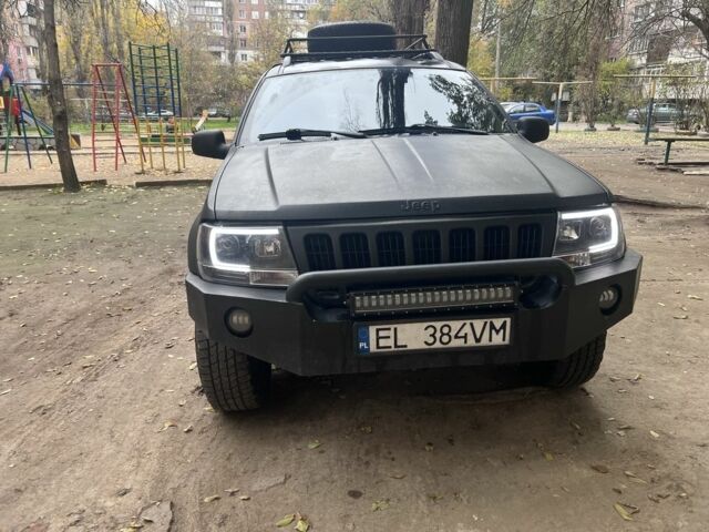 Черный Джип Гранд Чероки, объемом двигателя 2.7 л и пробегом 283 тыс. км за 6000 $, фото 1 на Automoto.ua