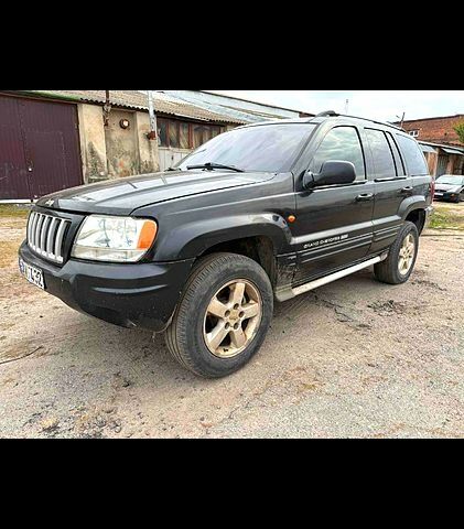 Чорний Джип Grand Cherokee, об'ємом двигуна 2.7 л та пробігом 263 тис. км за 3700 $, фото 1 на Automoto.ua