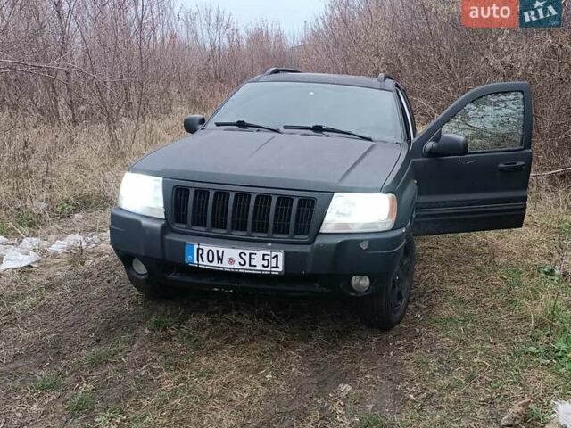 Черный Джип Гранд Чероки, объемом двигателя 2.69 л и пробегом 380 тыс. км за 4700 $, фото 1 на Automoto.ua