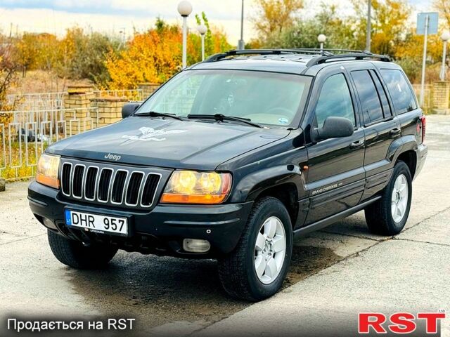 Джип Гранд Чероки 2003 в Новомосковске на Automoto.ua Черный Джип Гранд Чероки, объемом двигателя 3 л и пробегом 204 тыс. км за 3670 $, фото 1 на Automoto.ua