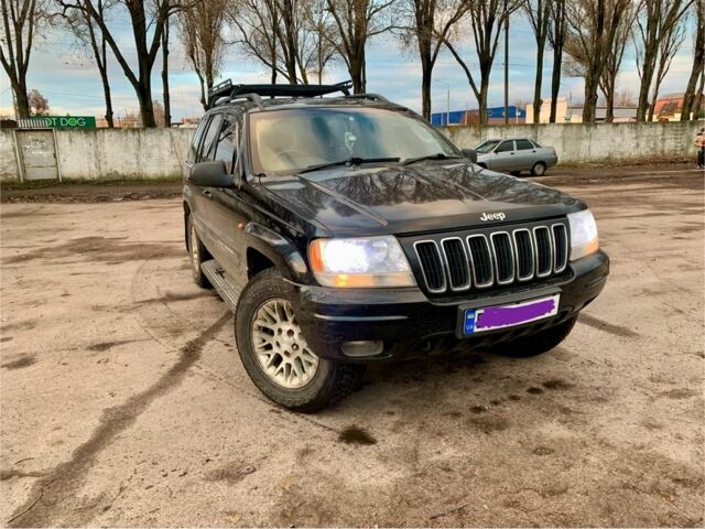 Черный Джип Гранд Чероки, объемом двигателя 2.7 л и пробегом 240 тыс. км за 5500 $, фото 1 на Automoto.ua