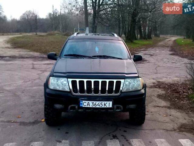 Черный Джип Гранд Чероки, объемом двигателя 2.69 л и пробегом 248 тыс. км за 8400 $, фото 1 на Automoto.ua