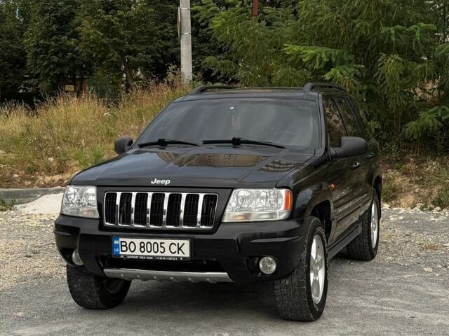 Чорний Джип Grand Cherokee, об'ємом двигуна 2.69 л та пробігом 250 тис. км за 10500 $, фото 1 на Automoto.ua