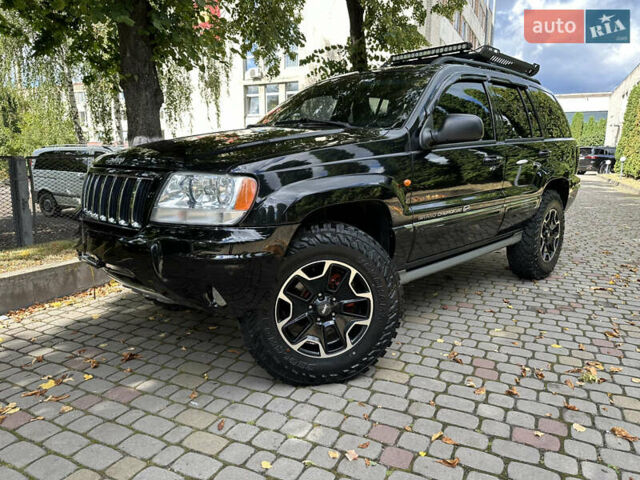 Чорний Джип Grand Cherokee, об'ємом двигуна 2.69 л та пробігом 286 тис. км за 16000 $, фото 1 на Automoto.ua