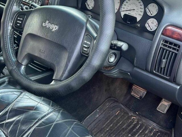 Джип Гранд Чероки 2004 в Харькове на Automoto.ua Черный Джип Гранд Чероки, объемом двигателя 2.7 л и пробегом 200 тыс. км за 4797 $, фото 1 на Automoto.ua