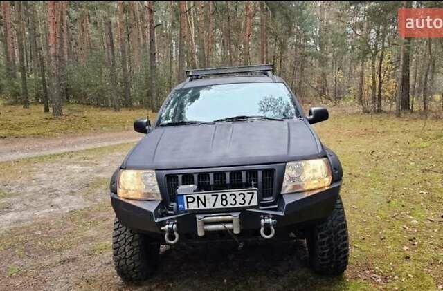 Черный Джип Гранд Чероки, объемом двигателя 0 л и пробегом 243 тыс. км за 4594 $, фото 1 на Automoto.ua