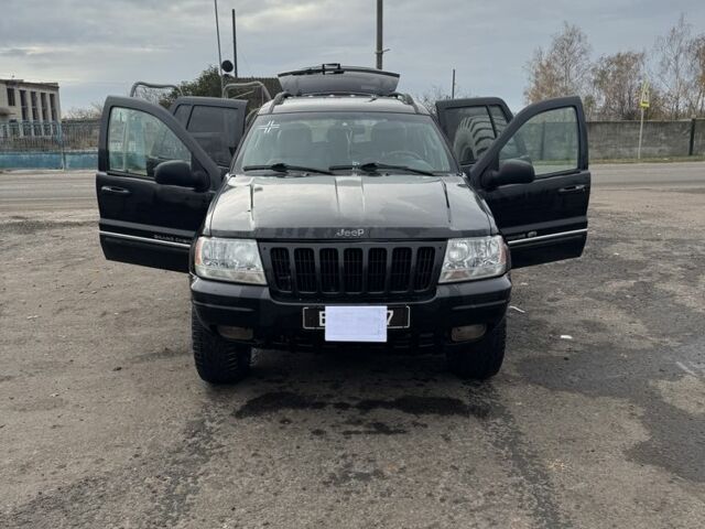 Чорний Джип Grand Cherokee, об'ємом двигуна 2.7 л та пробігом 320 тис. км за 4525 $, фото 1 на Automoto.ua