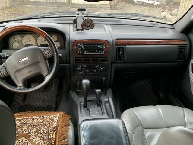 Чорний Джип Grand Cherokee, об'ємом двигуна 2.7 л та пробігом 220 тис. км за 6000 $, фото 1 на Automoto.ua