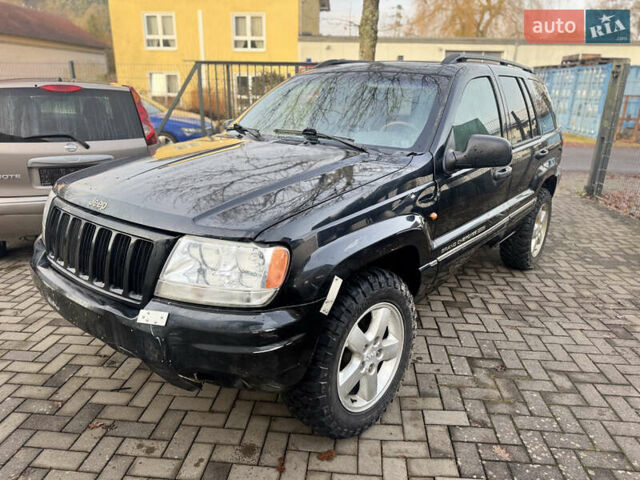 Черный Джип Гранд Чероки, объемом двигателя 2.7 л и пробегом 221 тыс. км за 3142 $, фото 1 на Automoto.ua