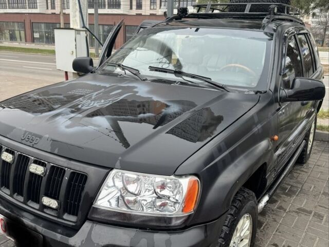 Черный Джип Гранд Чероки, объемом двигателя 2.7 л и пробегом 370 тыс. км за 6000 $, фото 1 на Automoto.ua