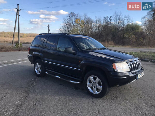 Черный Джип Гранд Чероки, объемом двигателя 2.7 л и пробегом 280 тыс. км за 4999 $, фото 1 на Automoto.ua
