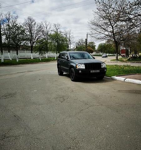 Чорний Джип Grand Cherokee, об'ємом двигуна 3 л та пробігом 300 тис. км за 11000 $, фото 1 на Automoto.ua