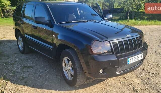 Чорний Джип Grand Cherokee, об'ємом двигуна 5.7 л та пробігом 300 тис. км за 13700 $, фото 1 на Automoto.ua