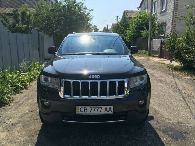 Чорний Джип Grand Cherokee, об'ємом двигуна 3 л та пробігом 152 тис. км за 28000 $, фото 1 на Automoto.ua