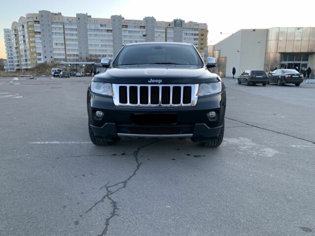 Чорний Джип Grand Cherokee, об'ємом двигуна 0.04 л та пробігом 140 тис. км за 20900 $, фото 1 на Automoto.ua