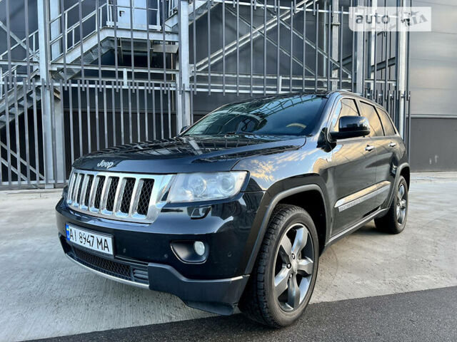 Чорний Джип Grand Cherokee, об'ємом двигуна 3 л та пробігом 273 тис. км за 17500 $, фото 1 на Automoto.ua