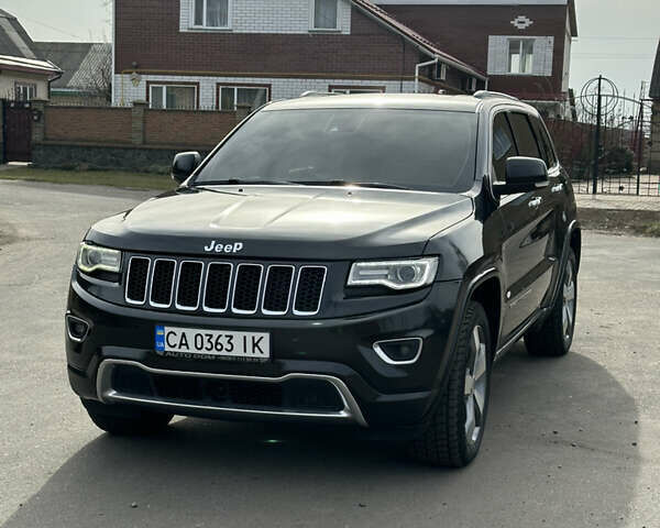 Чорний Джип Grand Cherokee, об'ємом двигуна 3 л та пробігом 215 тис. км за 24800 $, фото 1 на Automoto.ua