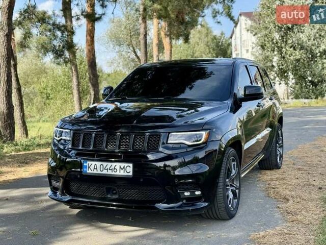 Чорний Джип Grand Cherokee, об'ємом двигуна 6.42 л та пробігом 120 тис. км за 35500 $, фото 1 на Automoto.ua