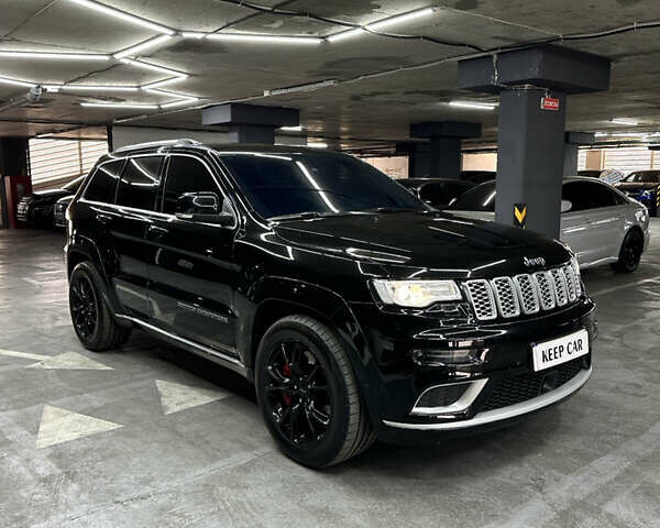 Чорний Джип Grand Cherokee, об'ємом двигуна 5.65 л та пробігом 91 тис. км за 30000 $, фото 1 на Automoto.ua