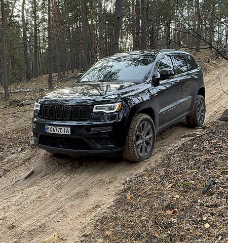 Черный Джип Гранд Чероки, объемом двигателя 5.65 л и пробегом 86 тыс. км за 35000 $, фото 1 на Automoto.ua