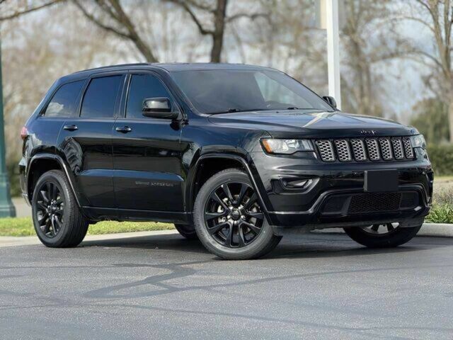 Чорний Джип Grand Cherokee, об'ємом двигуна 0.36 л та пробігом 65 тис. км за 24000 $, фото 1 на Automoto.ua