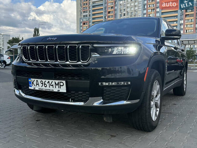 Черный Джип Гранд Чероки, объемом двигателя 5.65 л и пробегом 105 тыс. км за 43000 $, фото 1 на Automoto.ua