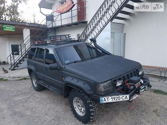 Чорний Джип Grand Cherokee, об'ємом двигуна 4 л та пробігом 1 тис. км за 10000 $, фото 1 на Automoto.ua