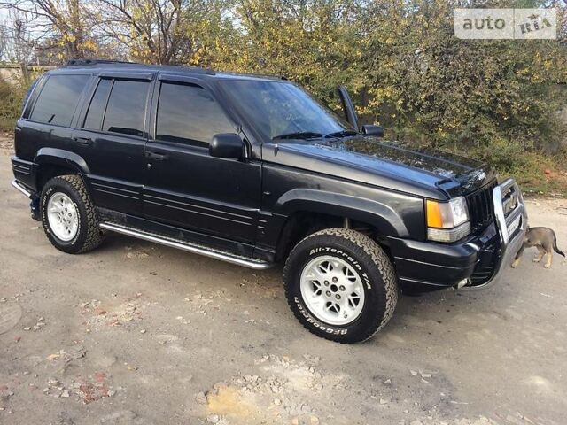 Чорний Джип Grand Cherokee, об'ємом двигуна 2 л та пробігом 270 тис. км за 7000 $, фото 1 на Automoto.ua