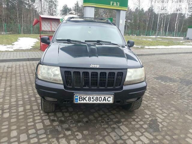 Чорний Джип Grand Cherokee, об'ємом двигуна 4.7 л та пробігом 280 тис. км за 6500 $, фото 1 на Automoto.ua