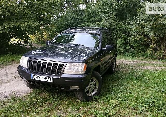 Чорний Джип Grand Cherokee, об'ємом двигуна 3.1 л та пробігом 230 тис. км за 2800 $, фото 1 на Automoto.ua