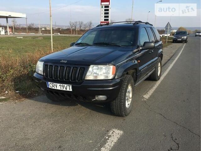 Чорний Джип Grand Cherokee, об'ємом двигуна 3.1 л та пробігом 310 тис. км за 4699 $, фото 1 на Automoto.ua