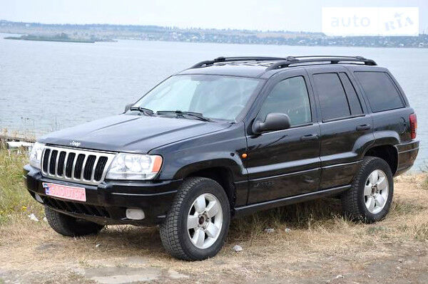 Чорний Джип Grand Cherokee, об'ємом двигуна 2.7 л та пробігом 320 тис. км за 8900 $, фото 1 на Automoto.ua