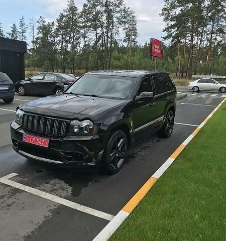 Чорний Джип Grand Cherokee, об'ємом двигуна 6.1 л та пробігом 90 тис. км за 19999 $, фото 1 на Automoto.ua