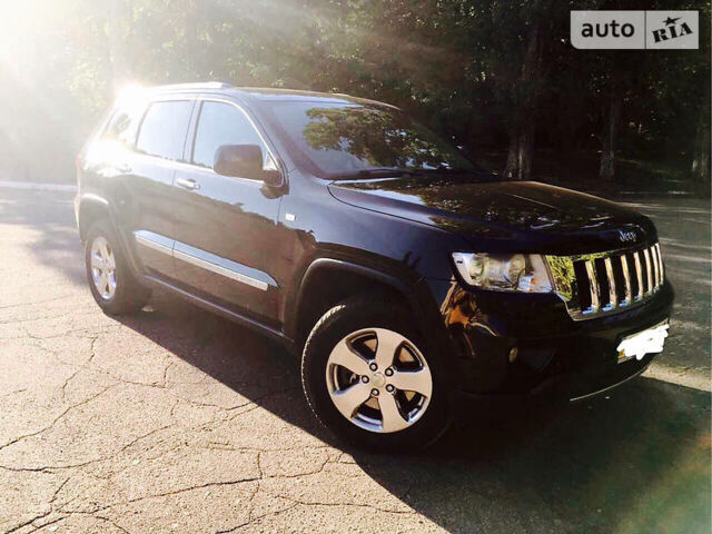 Чорний Джип Grand Cherokee, об'ємом двигуна 3 л та пробігом 111 тис. км за 29000 $, фото 1 на Automoto.ua