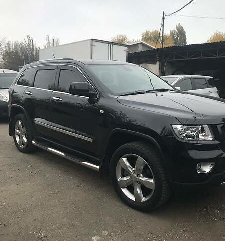 Чорний Джип Grand Cherokee, об'ємом двигуна 3 л та пробігом 174 тис. км за 26500 $, фото 1 на Automoto.ua