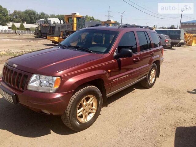 Гранатовий Джип Grand Cherokee, об'ємом двигуна 3.1 л та пробігом 175 тис. км за 8000 $, фото 1 на Automoto.ua