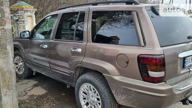 Коричневий Джип Grand Cherokee, об'ємом двигуна 4.7 л та пробігом 224 тис. км за 6000 $, фото 1 на Automoto.ua