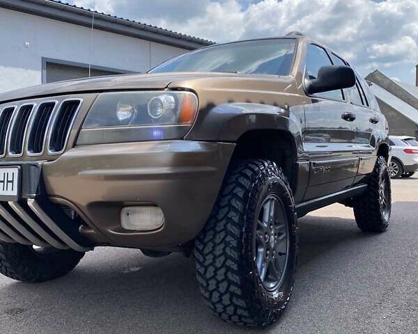 Коричневий Джип Grand Cherokee, об'ємом двигуна 3.96 л та пробігом 294 тис. км за 11250 $, фото 1 на Automoto.ua