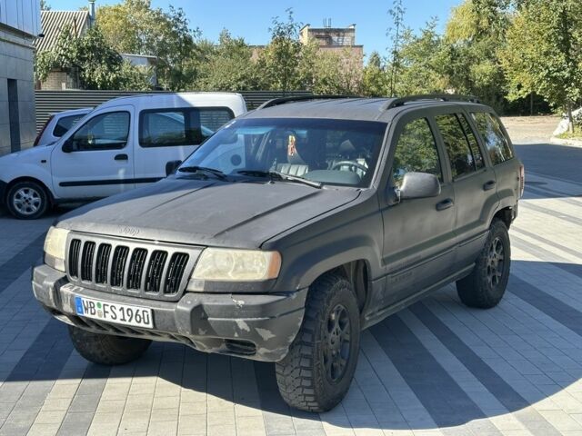 Коричневий Джип Grand Cherokee, об'ємом двигуна 4 л та пробігом 300 тис. км за 1900 $, фото 1 на Automoto.ua
