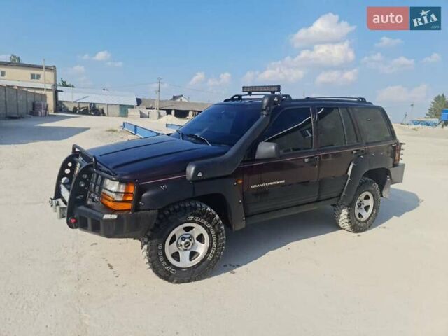Червоний Джип Grand Cherokee, об'ємом двигуна 2.5 л та пробігом 250 тис. км за 7500 $, фото 1 на Automoto.ua