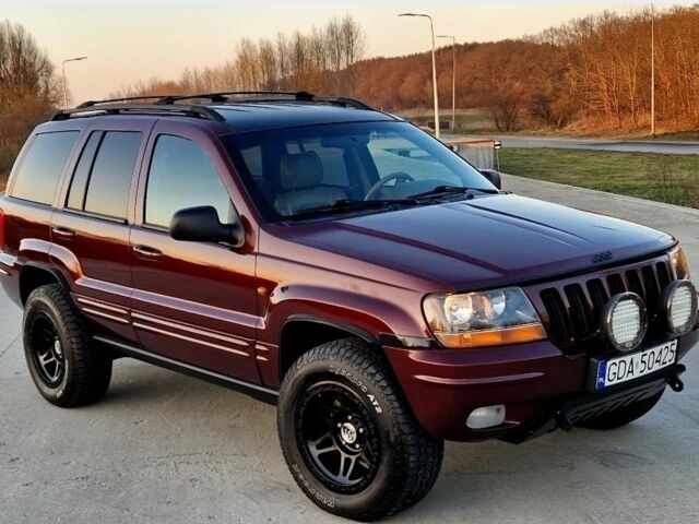 Красный Джип Гранд Чероки, объемом двигателя 3 л и пробегом 210 тыс. км за 2750 $, фото 1 на Automoto.ua
