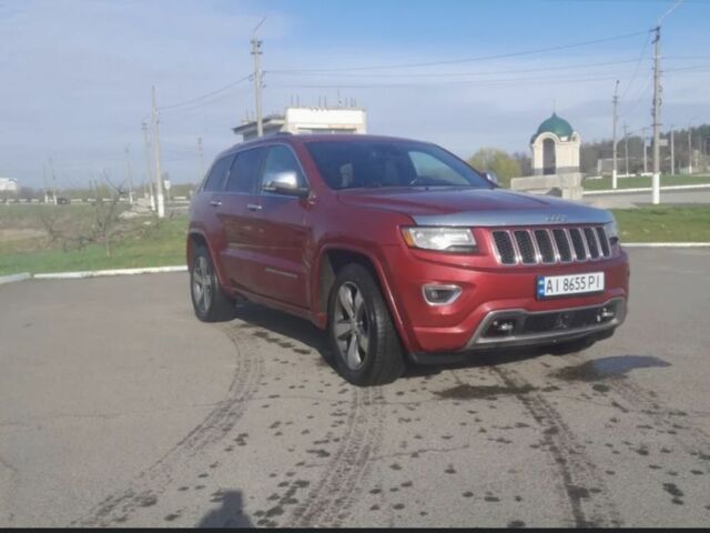 Червоний Джип Grand Cherokee, об'ємом двигуна 3 л та пробігом 110 тис. км за 21000 $, фото 1 на Automoto.ua