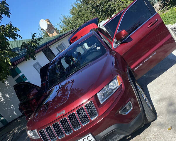 Червоний Джип Grand Cherokee, об'ємом двигуна 3.6 л та пробігом 157 тис. км за 25300 $, фото 1 на Automoto.ua