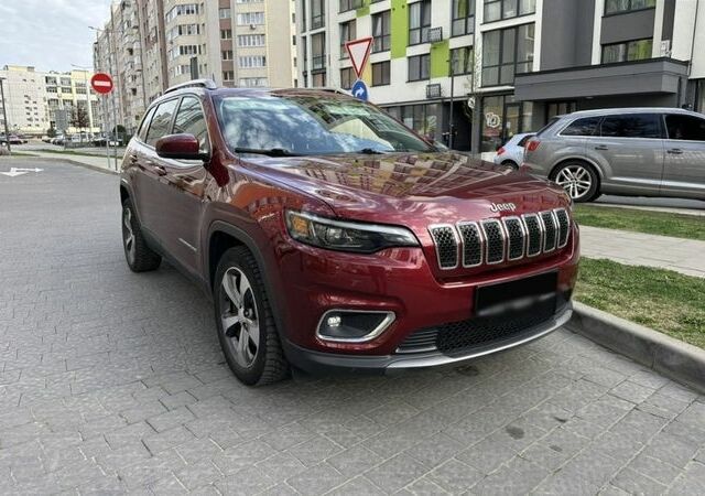 Красный Джип Гранд Чероки, объемом двигателя 2.4 л и пробегом 99 тыс. км за 19800 $, фото 1 на Automoto.ua