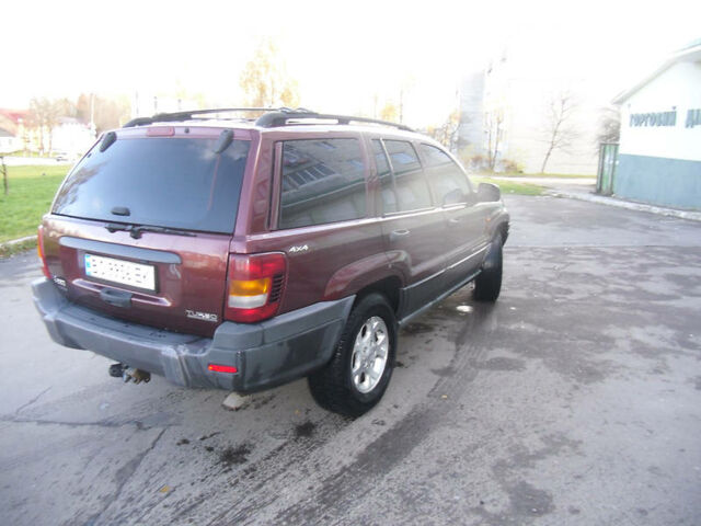 Червоний Джип Grand Cherokee, об'ємом двигуна 3.1 л та пробігом 260 тис. км за 7300 $, фото 1 на Automoto.ua