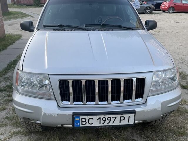 Сірий Джип Grand Cherokee, об'ємом двигуна 0.27 л та пробігом 266 тис. км за 12000 $, фото 1 на Automoto.ua