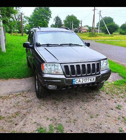 Сірий Джип Grand Cherokee, об'ємом двигуна 4.7 л та пробігом 393 тис. км за 7500 $, фото 1 на Automoto.ua