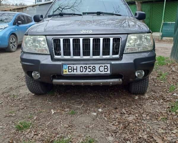 Серый Джип Гранд Чероки, объемом двигателя 3.12 л и пробегом 270 тыс. км за 13000 $, фото 1 на Automoto.ua