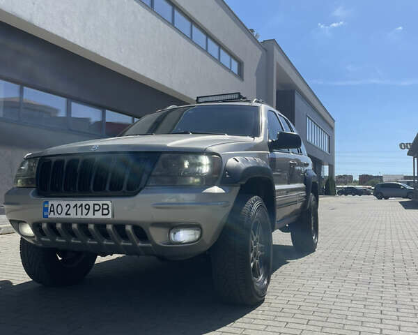 Сірий Джип Grand Cherokee, об'ємом двигуна 3.12 л та пробігом 260 тис. км за 9000 $, фото 1 на Automoto.ua